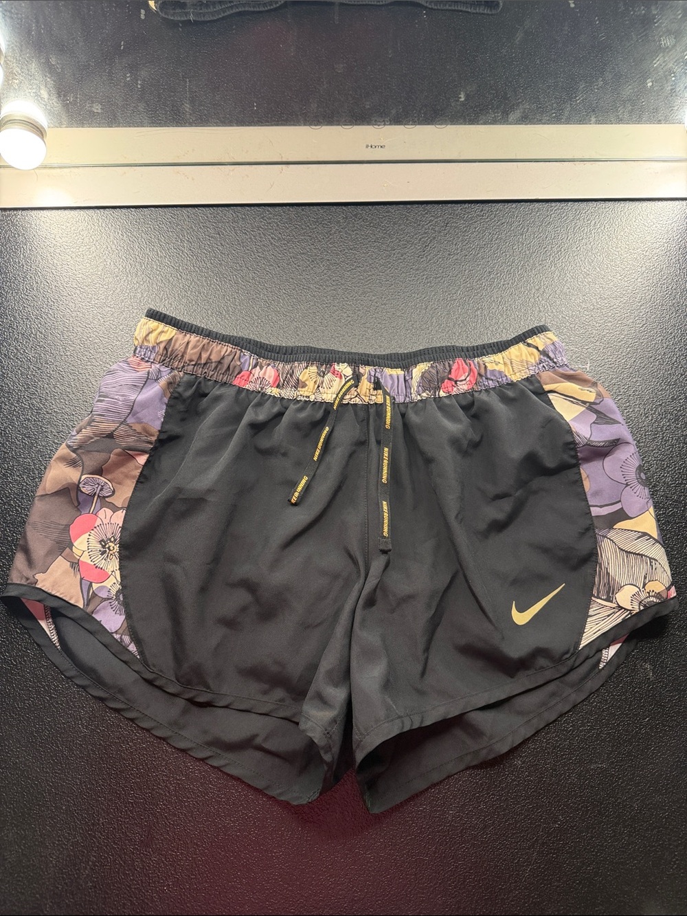 Nike Black Running Shorts with Floral Side Panels